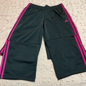Women’s Adidas Black and Pink Track Pants for Active Comfort.